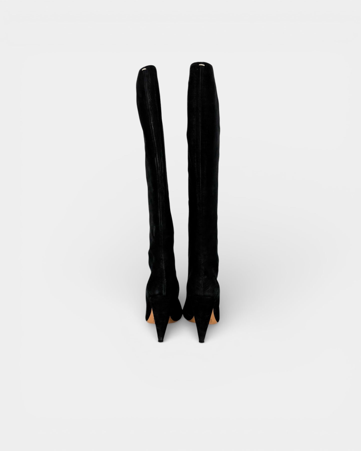 Hautes bottes cuir noir à découpes laser