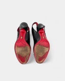 black patent leather pumps