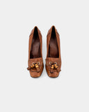 Brown leather pumps with tassels