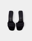 Mules en textile noir à talon sculpté
