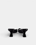 Mules en textile noir à talon sculpté