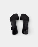 Mules en textile noir à talon sculpté