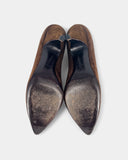 Brown suede pumps