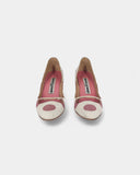 White pumps with pink polka dots