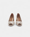 Beige pumps with bows