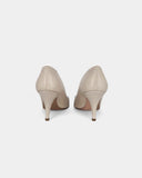 Beige pumps with bows