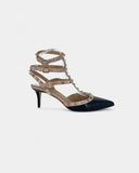 Black and beige studded pumps