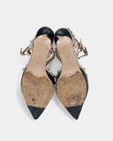 Black and beige studded pumps