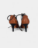 Brown lace-up sandals