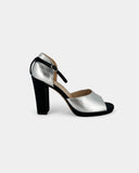 Silver and black heeled sandals