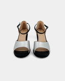 Silver and black heeled sandals