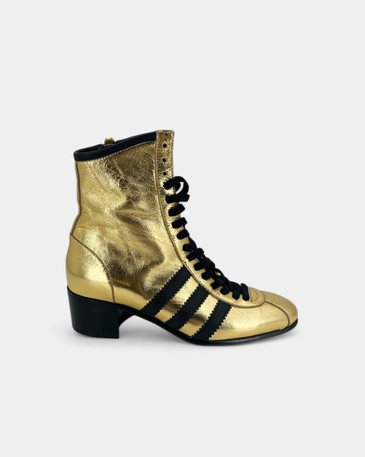 Gold and black ankle boots