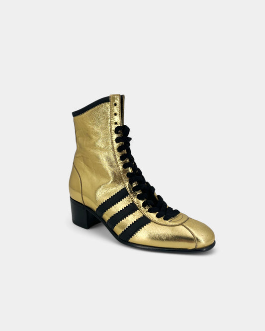 Gold and black ankle boots
