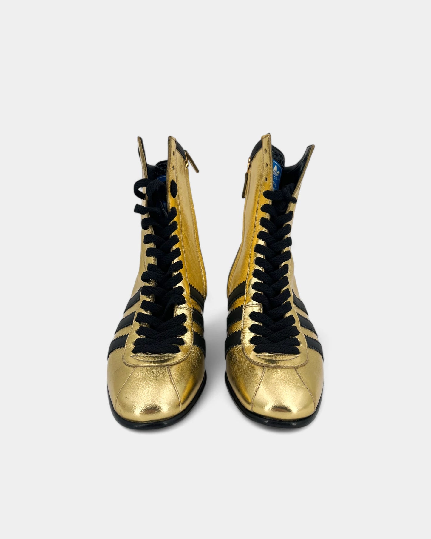Gold and black ankle boots
