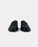 Black loafers
