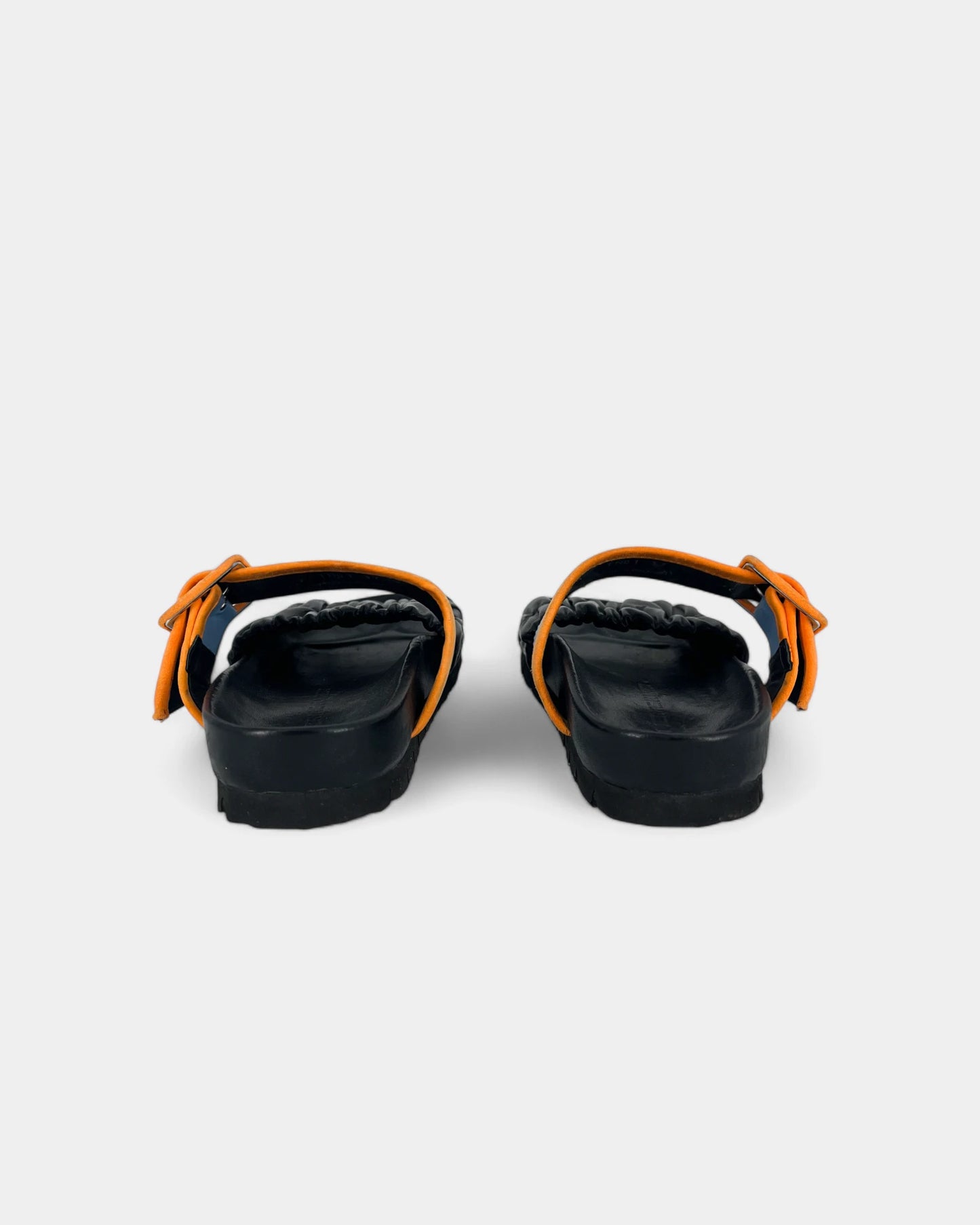 Black sandals with blue and orange straps