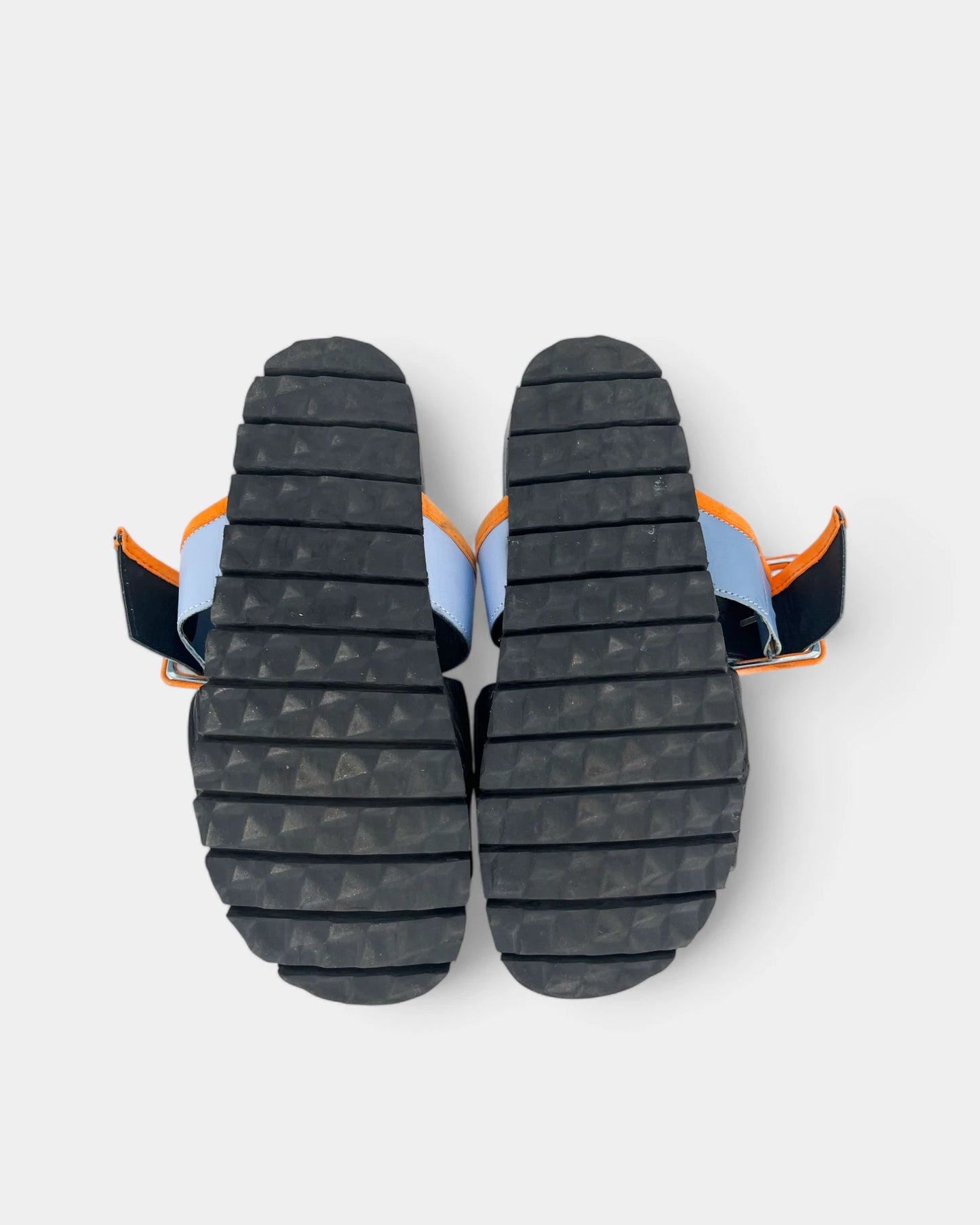Black sandals with blue and orange straps