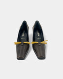 Brown pumps with bow