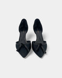 Black monogram pumps