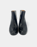 Bottines noires à talons compensés