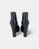 Bottines noires à talons compensés