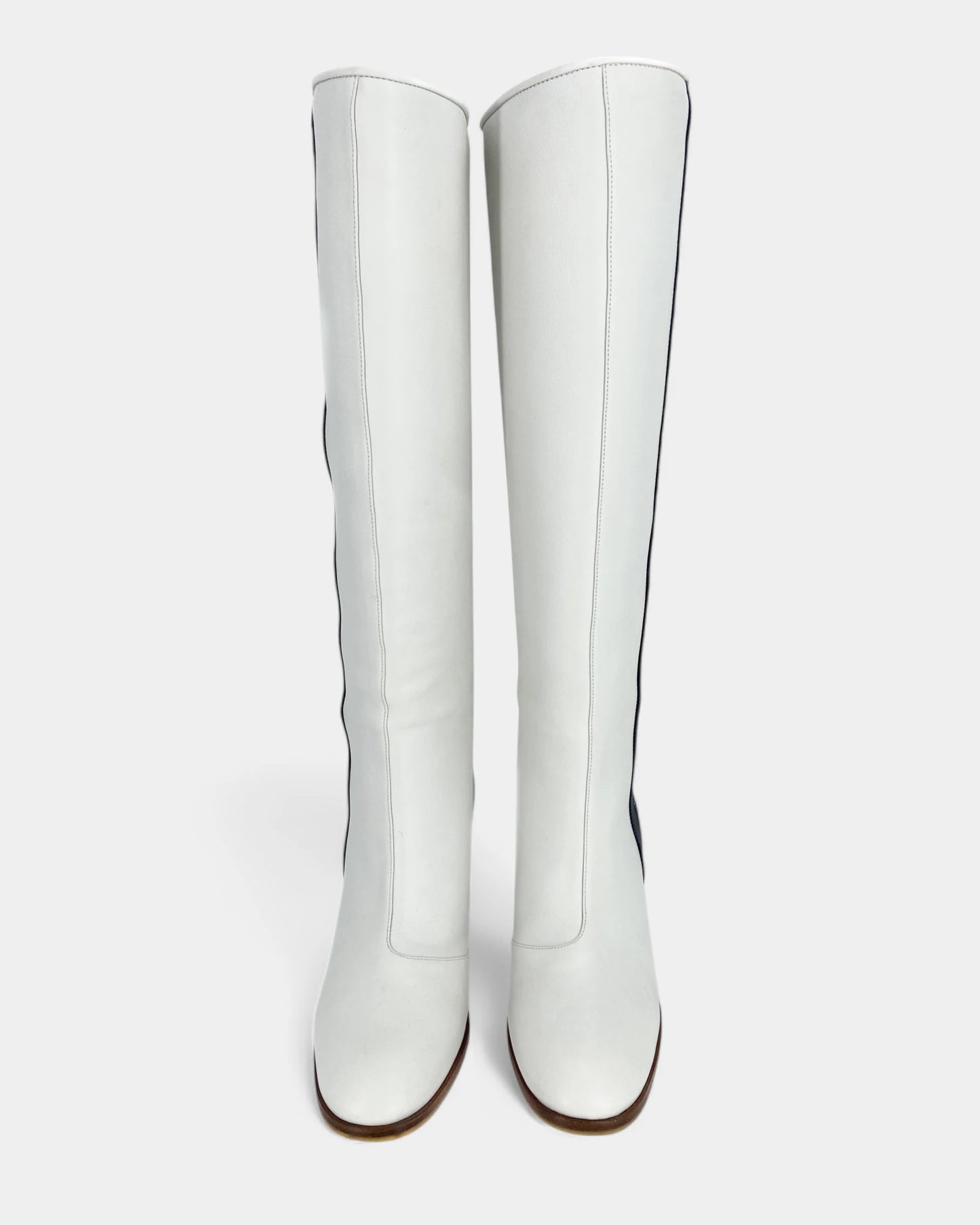 White boots with black lines
