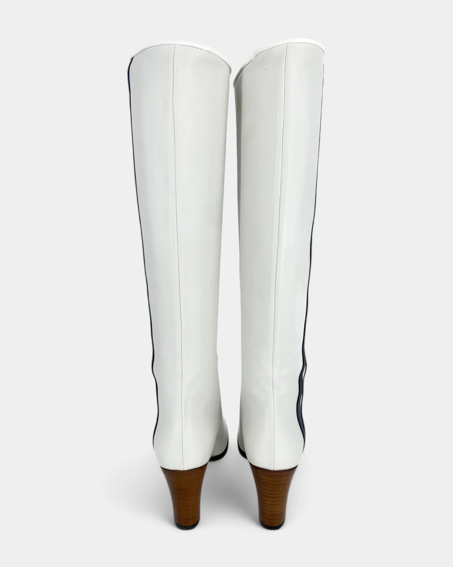 White boots with black lines