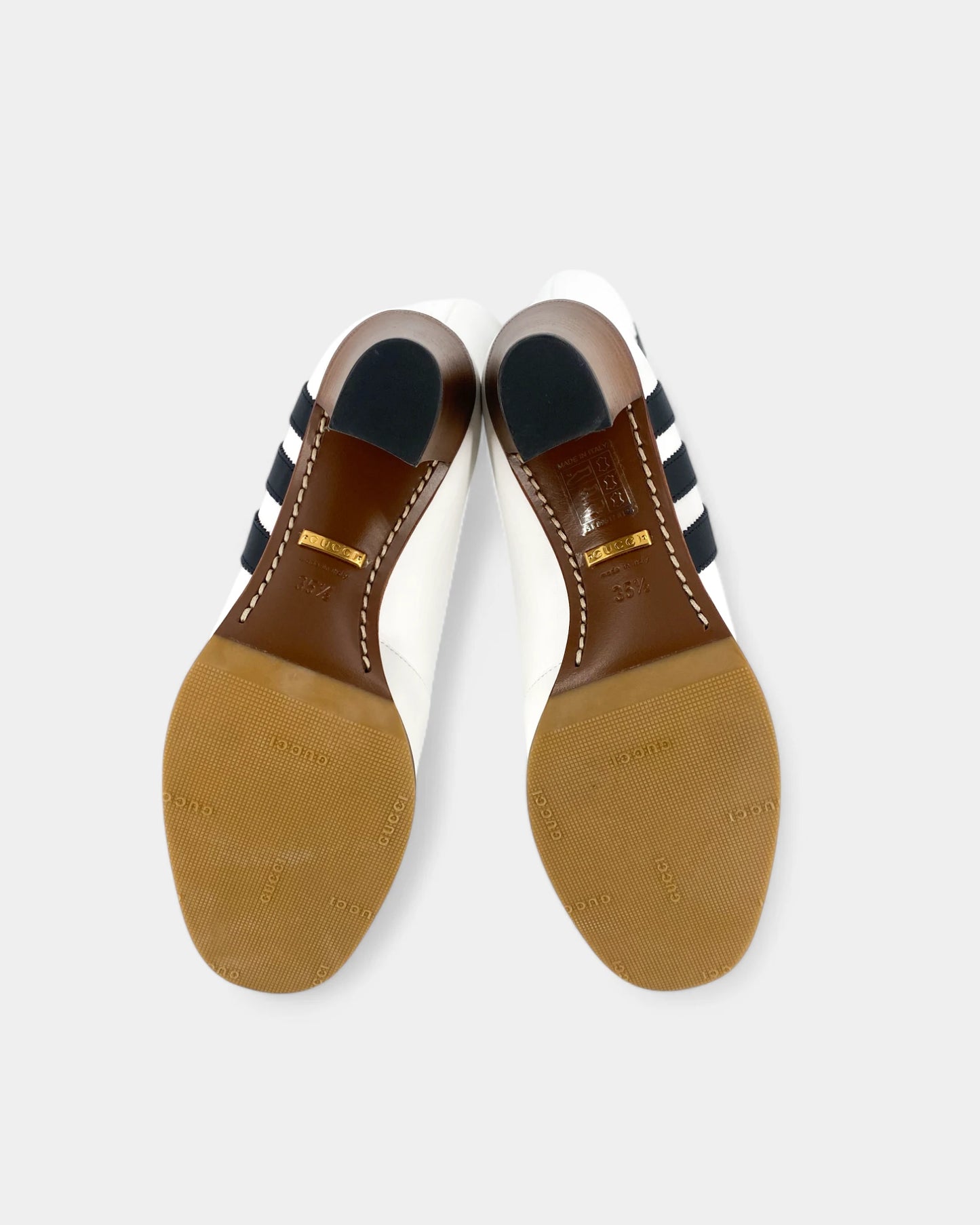 White boots with black lines