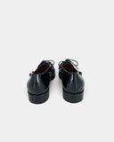 Mocassins noirs ornés de billes noires