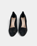Black suede pumps