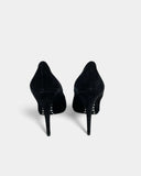 Black suede pumps