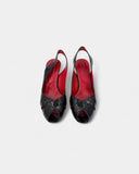 black patent leather pumps