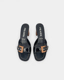 Mules noires à talon bois et boucle