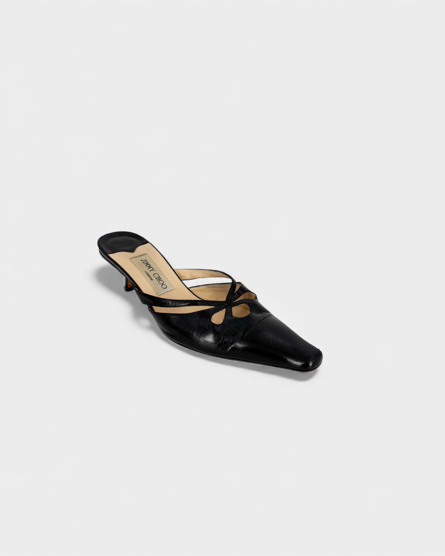 Mules à talons en cuir noir