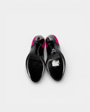 Two-tone pump in black patent leather and fuchsia suede