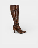 High boot in patinated brown leather