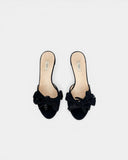 Mules noires à talon fleur