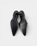 Escarpins vintage noirs à œillets dorés