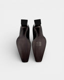 Black square-heeled pumps