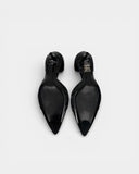 Black leather pumps