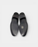 Black leather loafers