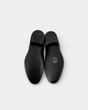 Black leather loafers