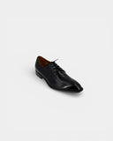 Black patent leather derbies