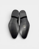 Black patent leather derbies