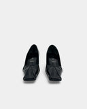 Black square toe pumps