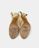 Cream slingbacks with a bow