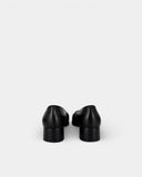 Mocassins en cuir noir à talon