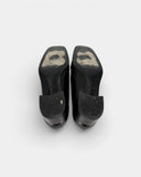 Mocassins en cuir noir à talon