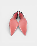 Pink and black heels