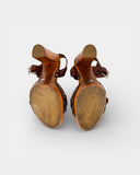Brown leather and wood heels
